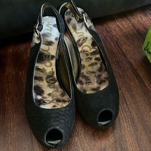 Skinny healed open toe heals. Open back with a small strap